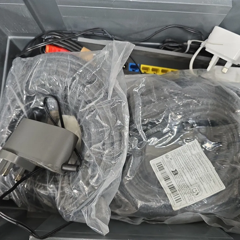 APPROXIMATELY 12 ASSORTED HOUSEHOLD ITEMS TO INCLUDE CABLES, TV REMOTES, ROUTERS, ETC
