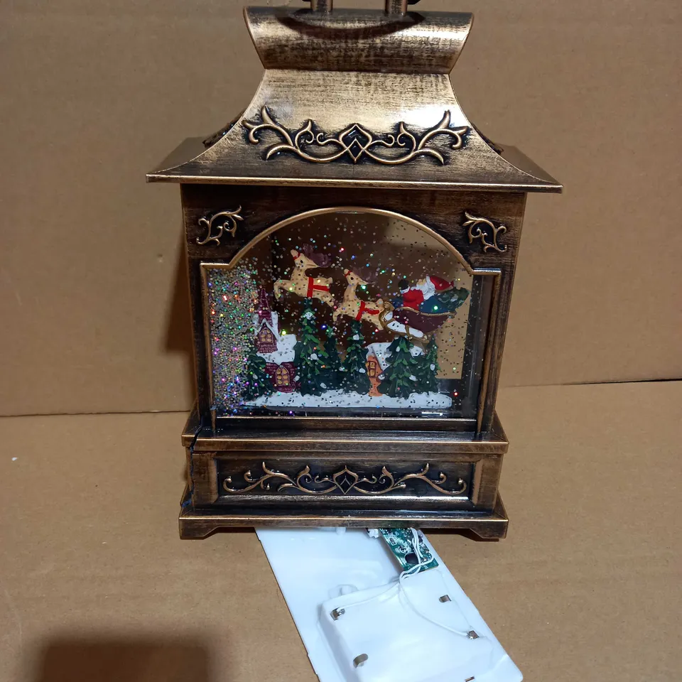 LOT OF 4 FESTIVE PRE-LIT MUSICAL WATER SPINNERS