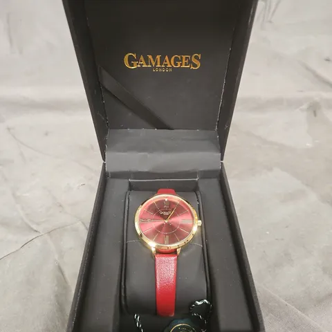 GAMAGES LONDON WRISTWATCH – GOLD-TONE CASE, RED DIAL & RED STRAP