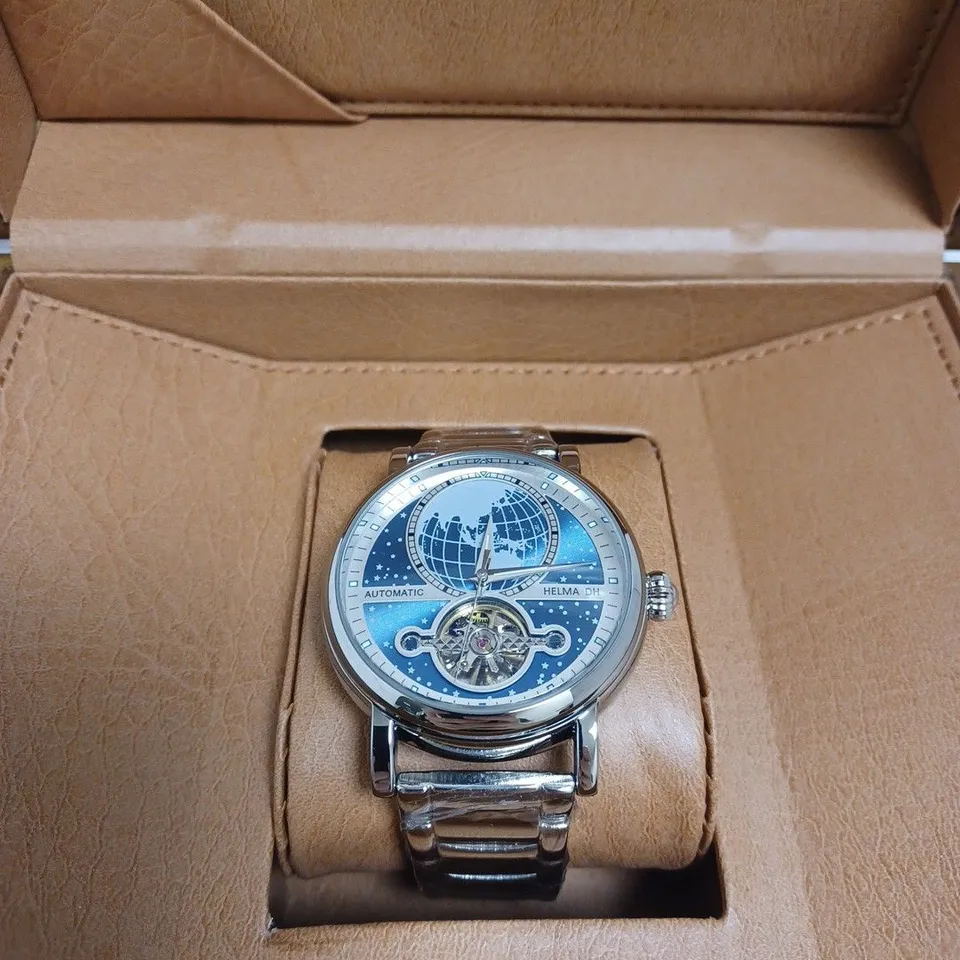 MEN’S HELMA DH AUTOMATIC WORLD VIEW WATCH – TOURBILLON MOVEMENT – BLUE DIAL – STAINLESS STEEL STRAP – GLASS EXHIBITION BACK CASE
