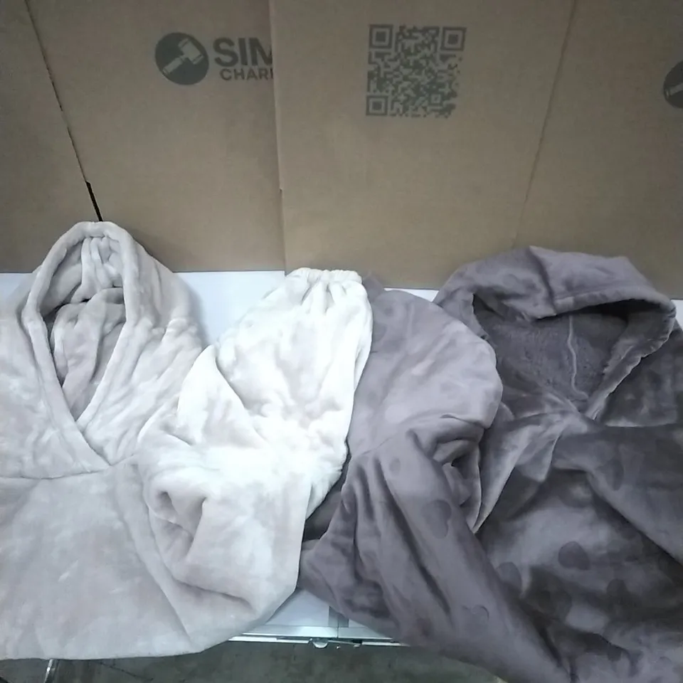 A PALLET TO CONTAIN APPROXIMATELY 60 WOMENS DESIGNER CLOTHES WHICH INCLUDE;PRETTY SECRETS OVERSIZED HOODIES ETC