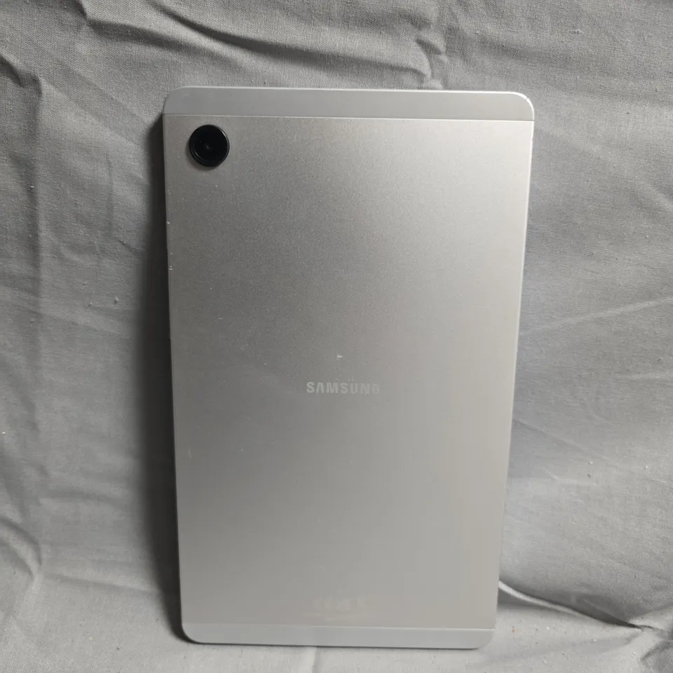 SAMSUNG TABLET – SILVER REAR, SINGLE REAR CAMERA - MODEL UNSPECIFIED 