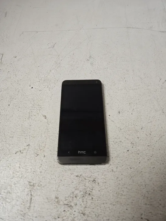 Lot 1517: HTC ONE MINI SMARTPHONE - 5893497 | Simon Charles Auctioneers