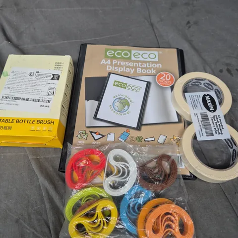 APPROXIMATELY 7 ASSORTED HOUSEHOLD ITEMS TO INCLUDE BOTTLE BRUSH, DISPLAY BOOK, MASKING TAPE ETC