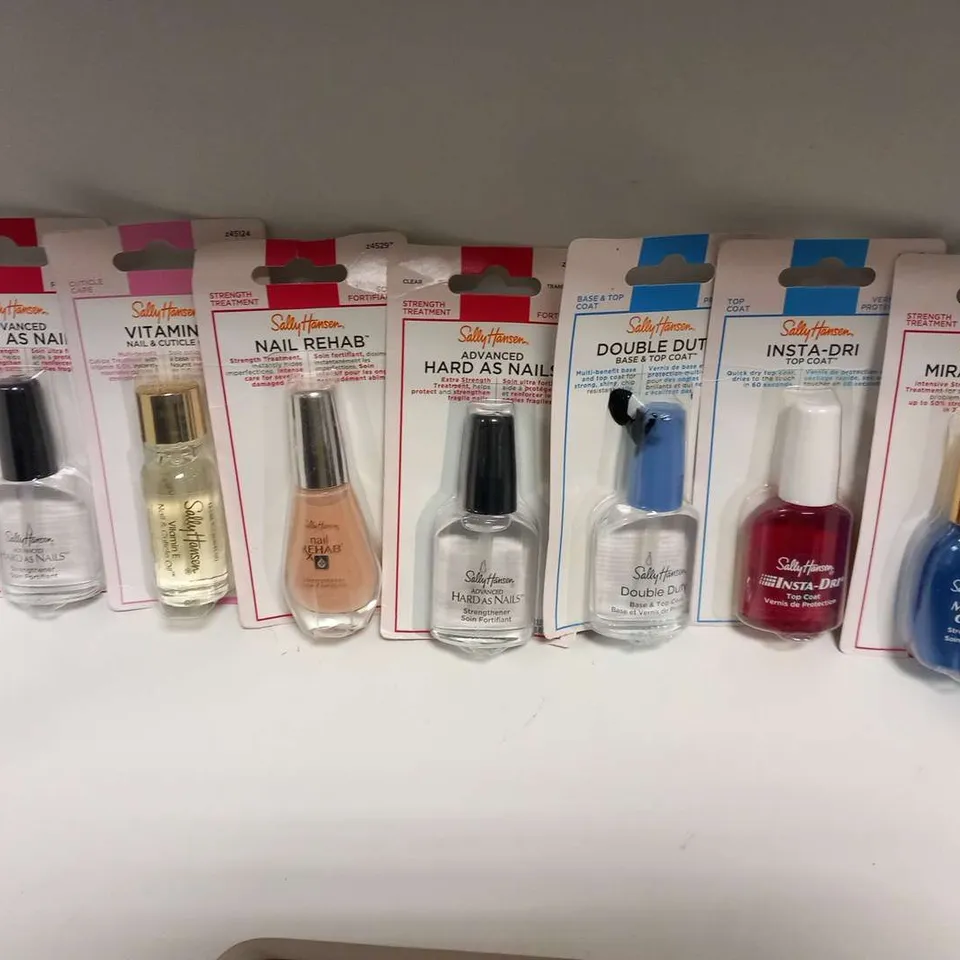 SEVEN ASSORTED SALLY HANSEN PRODUCTS TO INCLUDE; INSTA-DRI TOP COAT, MIRACLE CURE AND ADVANCED HARD AS NAILS