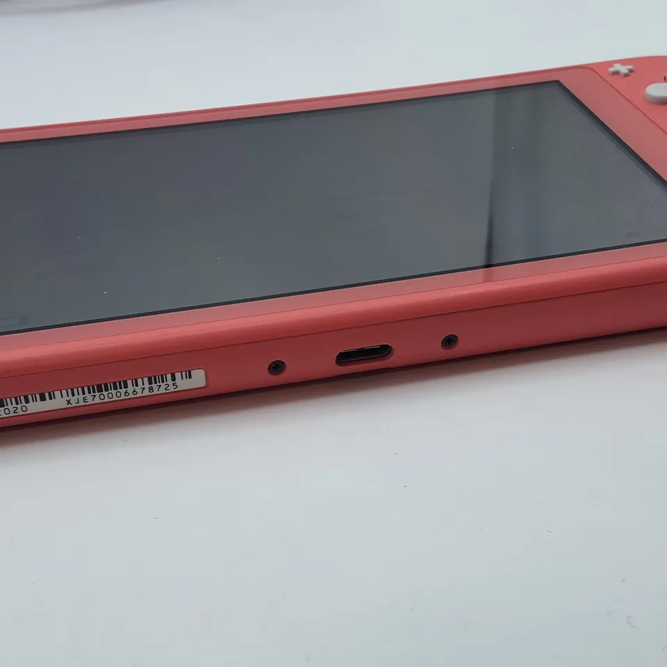 UNBOXED NINTENDO SWITCH LITE IN BLUSH WITH UNIFORM NUMSKULL CASE -HDH-001