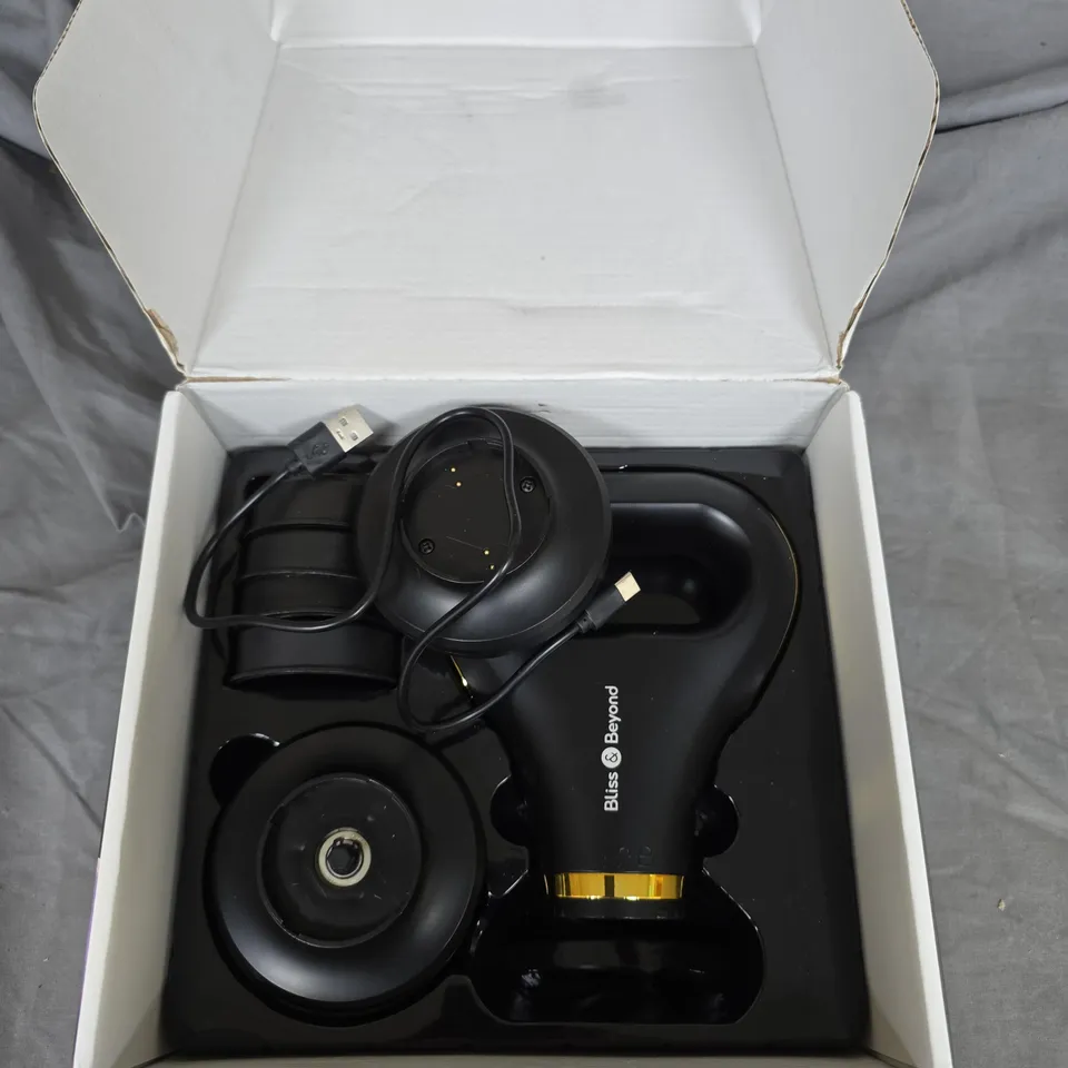 BLISS AND BEYOND MULTIFUNCTIONAL MASSAGE GUN