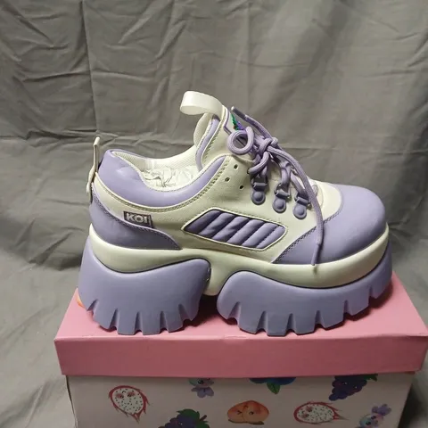 BOXED PAIR OF KOI FRUITTI TUTTI GRAPE JELLY TRAINERS IN PURPLE/WHITE SIZE UK 5