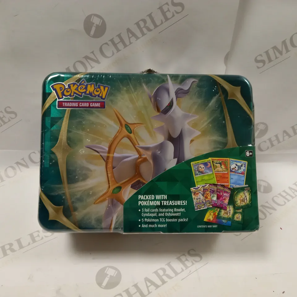 BOXED AND SEALED POKEMON TRADING CARD GAME CASE CONTAINING; 5 POKEMON TCG BOOSTER PACKS, 3 FOIL PROMO CARDS FEATURING ROWLET, CYNDAQUIL AND USHAWOTT, A COOL POKEMON COIN, 4 COLOURFUL STICKER SHEETS..