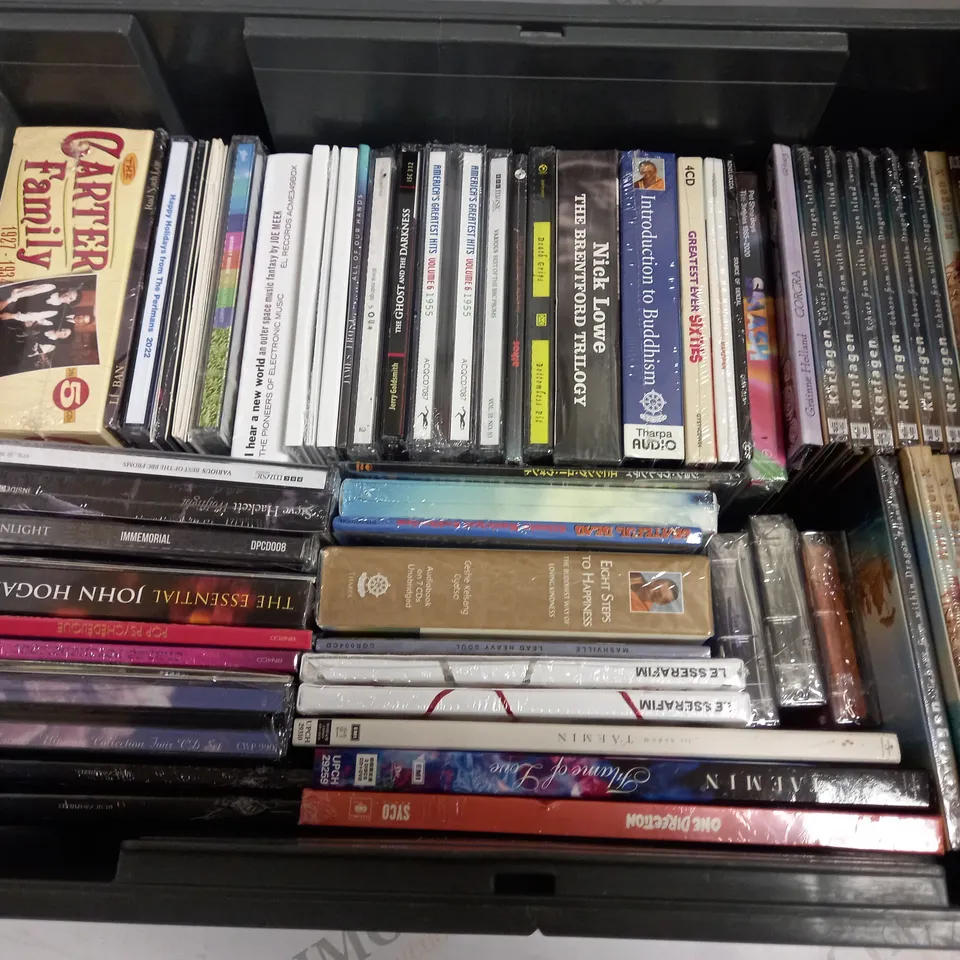 BOX OF APPROX 20 ASSORTED CDS INCLUDING INTRODUCTION TO BUDDISM, CARTER FAMILY AND NICK LOWE
