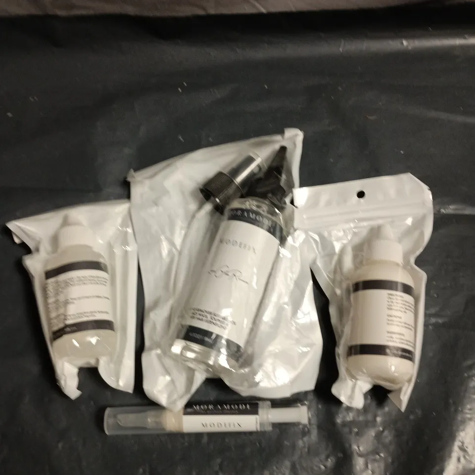 MORA MODE WIG GLUE AND WIG GLUE REMOVER WITH A DRAWSTRING BAG