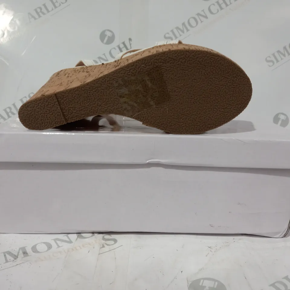 BOXED PAIR OF KRUSH OPEN TOE STRAPPY WEDGE HEEL SANDALS IN WHITE SIZE 4
