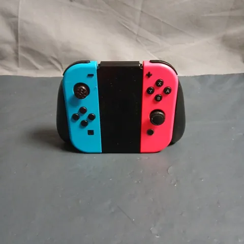 NINTENDO SWITCH JOY-CON CONTROLLERS (L BLUE, R NEON PINK) WITH GRIP 