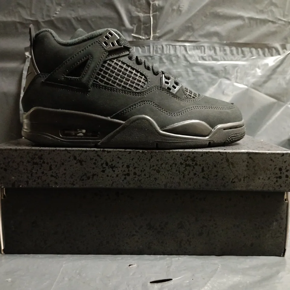 BOXED PAIR OF NIKE AIR JORDAN 4 RETRO SHOES IN BLACK SIZE UK 5