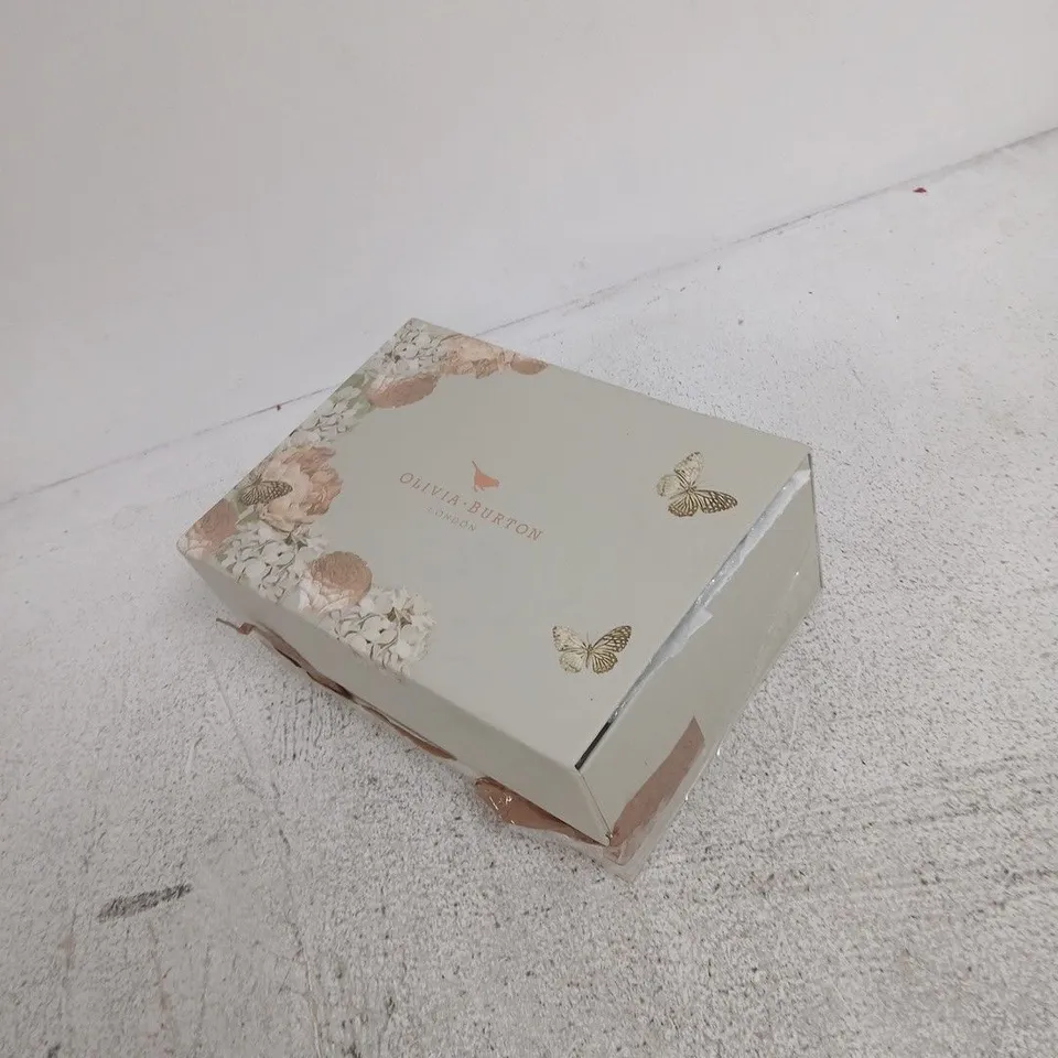 OLIVIA BURTON LONDON BOX WITH A MIX OF COSMETIC GOODS INSIDE