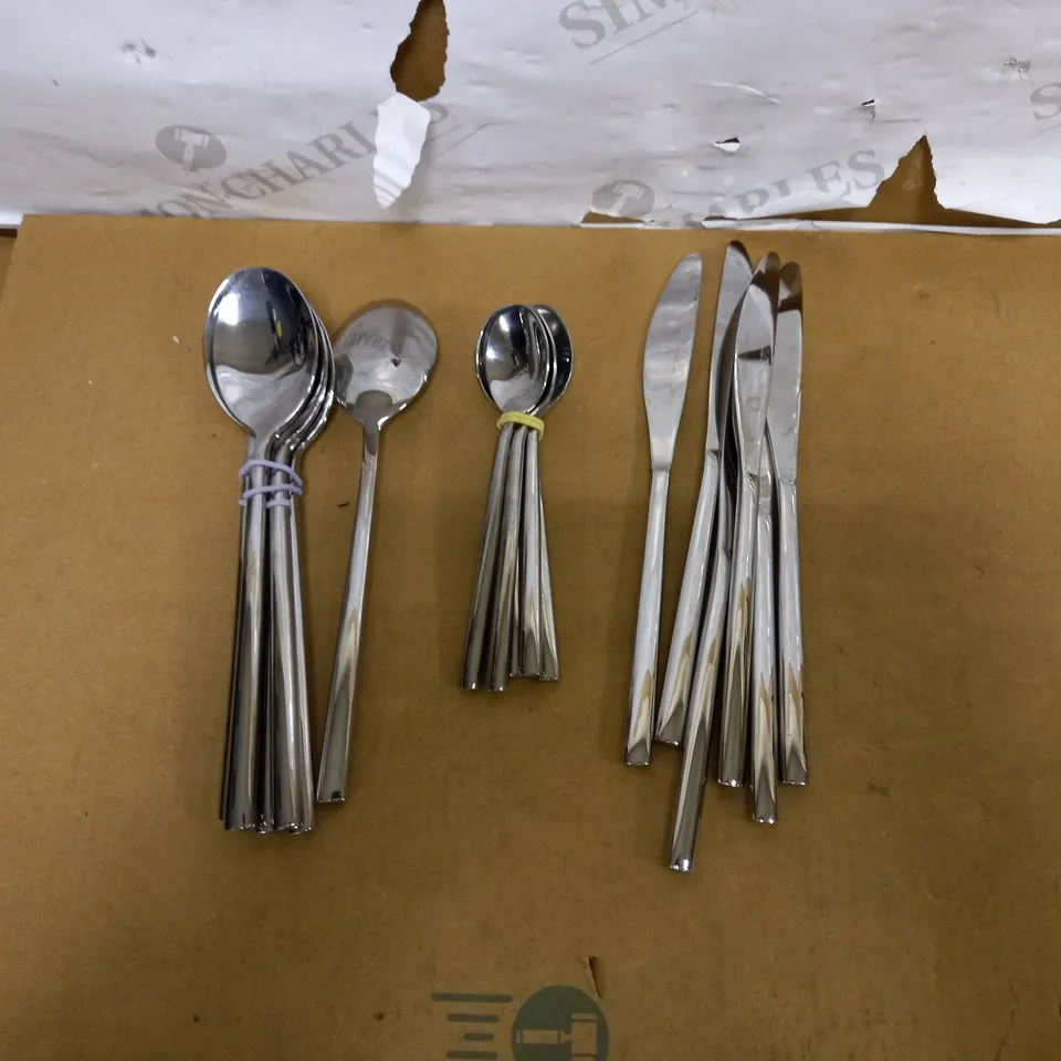 BOX OF APPROXIMATELY 6 EXZACT STAINLESS STEEL KNIVES, DESSERT SPOONS AND 5 TEASPOONS