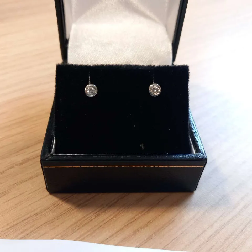 PLATINUM STUD EARRINGS RUB-OVER SET WITH NATURAL DIAMONDS