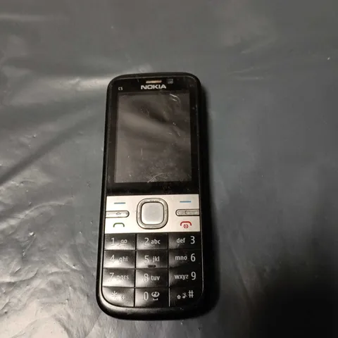 NOKIA MOBILE PHONE – BLACK WITH SILVER BACK