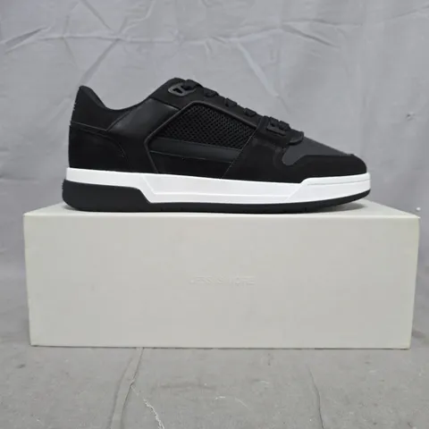 BOXED PAIR OF ARNE BASKET TRAINERS IN BLACK/WHITE SIZE UK 10