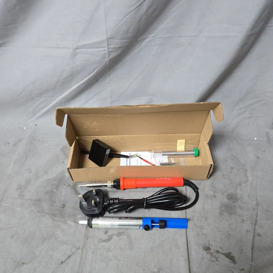 SOLDERING IRON KIT WITH ACCESSORIES – RED HANDHELD IRON, BLUE TOOL, IN BOX (MADE IN CHINA)