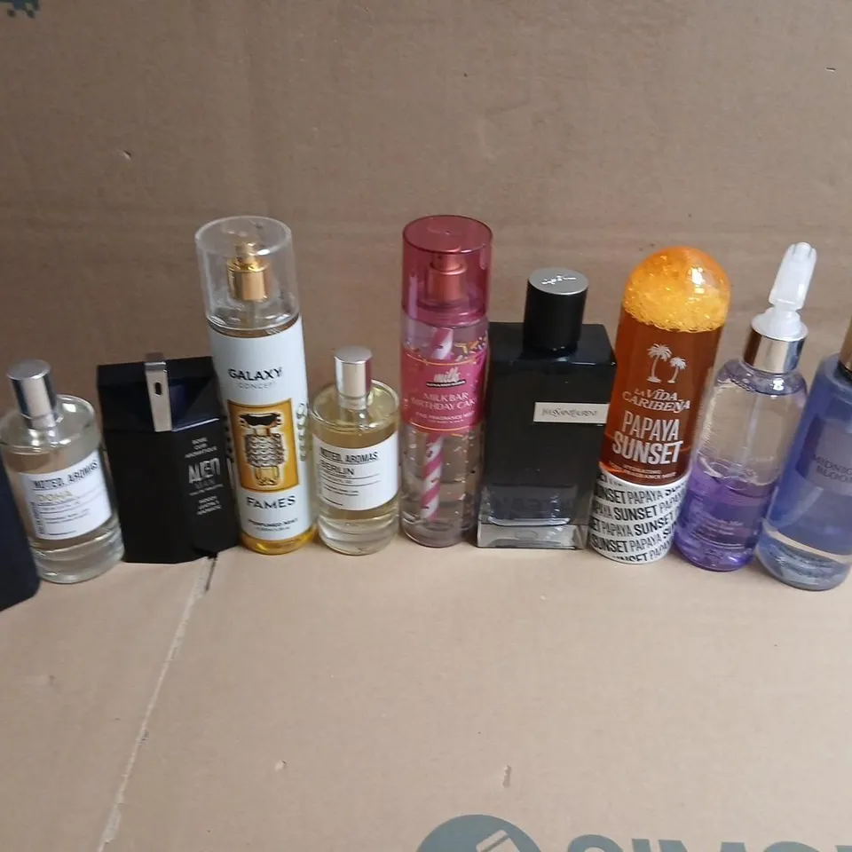 APPROXIMATELY 10 ASSORTED UNBOXED FRAGRANCES TO INCLUDE; VICTORIA'S SECRET, YVES SAINT LAURENT AND NOTED AROMAS