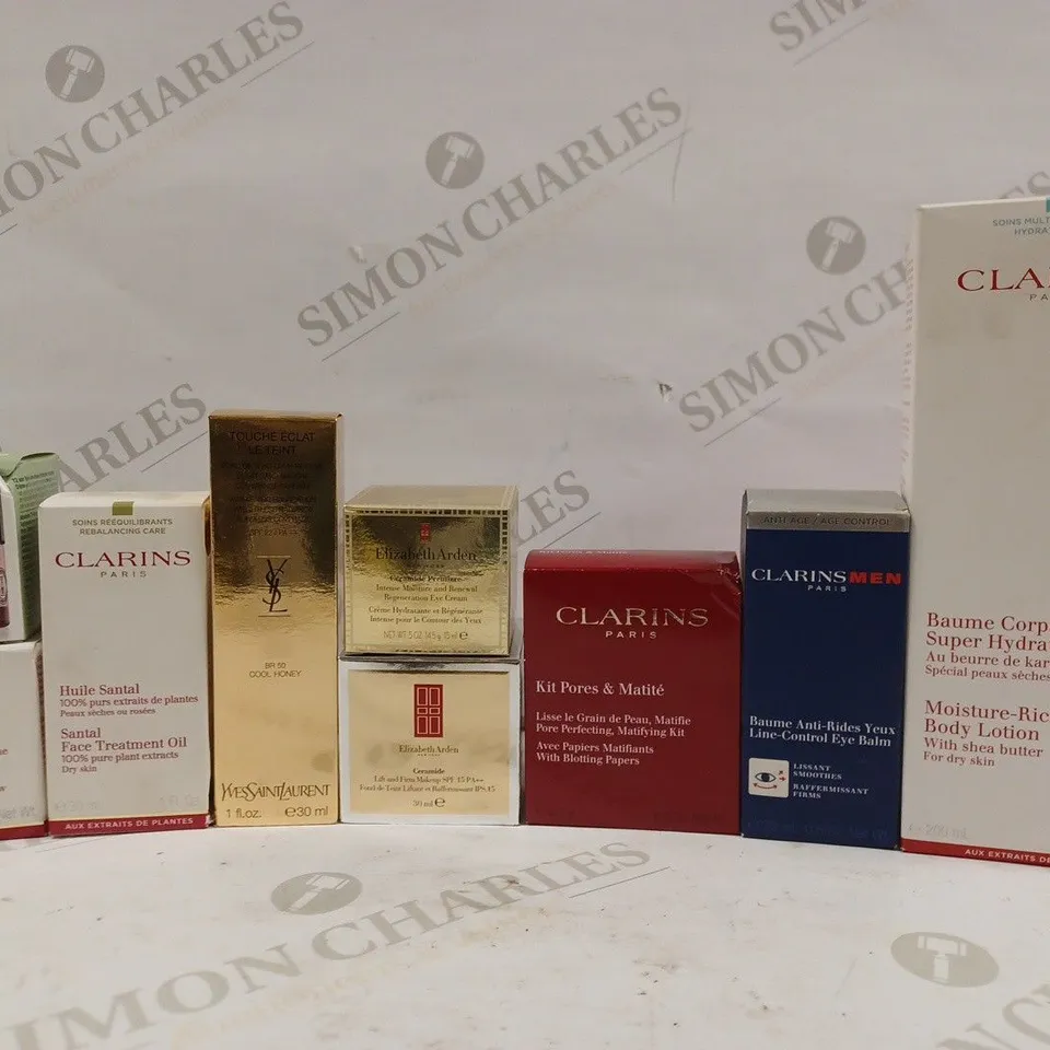 BOX OF APPROX 10 ASSORTED BEAUTY PRODUCTS TO INCLUDE CLARINS FACE TREATMENT OIL, YSL AWAKENING FOUNDATION #BR50 COOL HONEY, CLARINS MOISTURE-RICH BODY LOTION, ETC