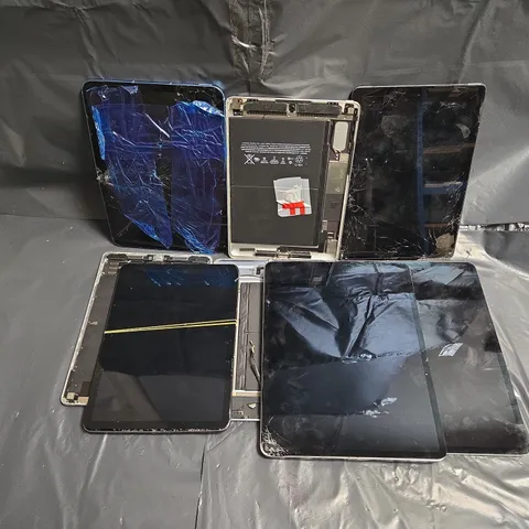 APPROXIMATELY 8 ASSORTED DAMAGED APPLE TABLETS IN VARIOUS MODELS & COLOURS