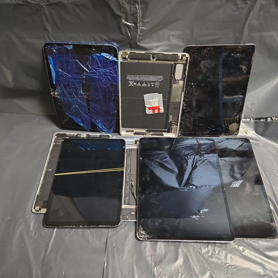 APPROXIMATELY 8 ASSORTED DAMAGED APPLE TABLETS IN VARIOUS MODELS & COLOURS