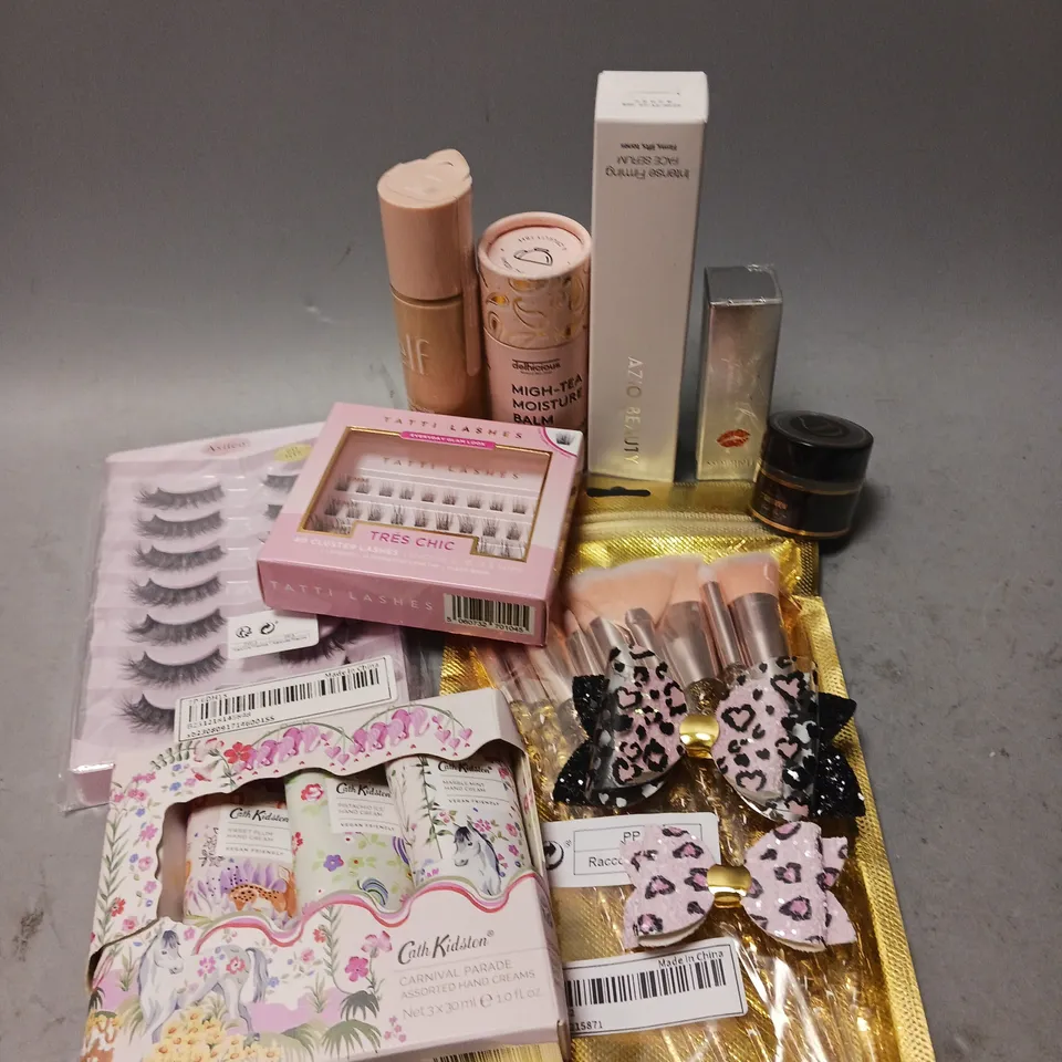 BOX OF APPROXIMATELY 10 COSMETIC ITEMS TO INCLUDE - ELF LIQUID FILLER IN 0.5 FAIR - AZIO BEAUTY FACE SERUM - TATTI LASHES CLUSTER LASHES - ETC 