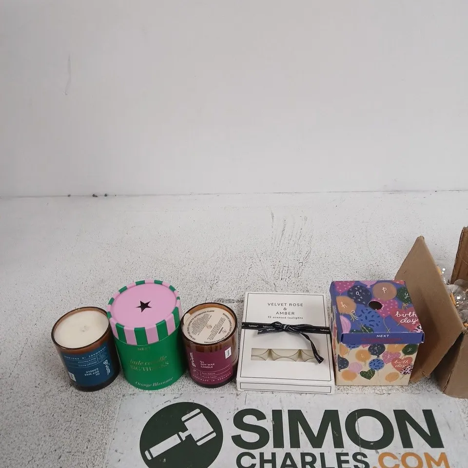 TOTE OF APPROXIMATELY 10 ASSORTED ITEMS INCLUDING SOME LIGHT BULBS, A NEXT WHITE JASMINE SCENTED CANDLE AND SOME HABITAT VELVET ROSE & AMBER SCENTED TEALIGHTS
