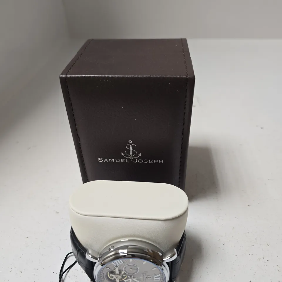 BOXED SAMUEL JOSEPH AUTOMATIC LIMITED EDITION SILVER TONE WATCH WITH WHITE DIAL