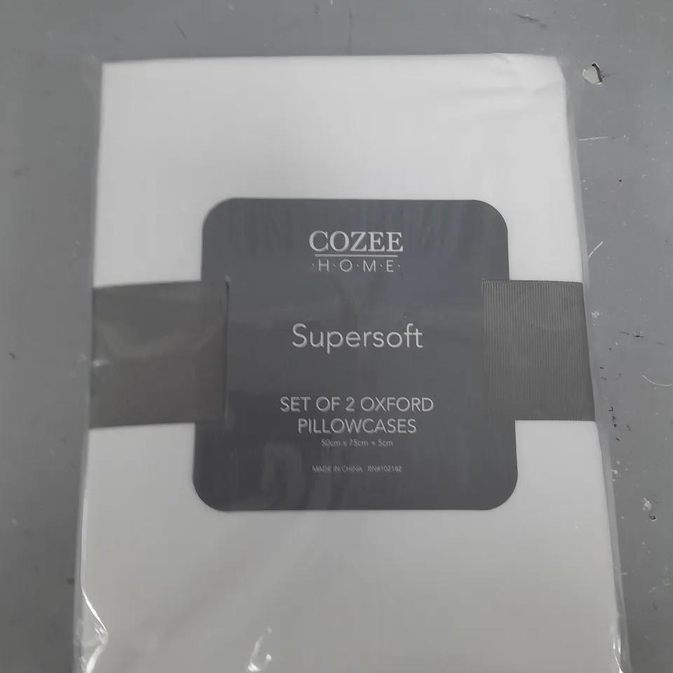 TWO WHITE COZEE HOME PILLOWCASES
