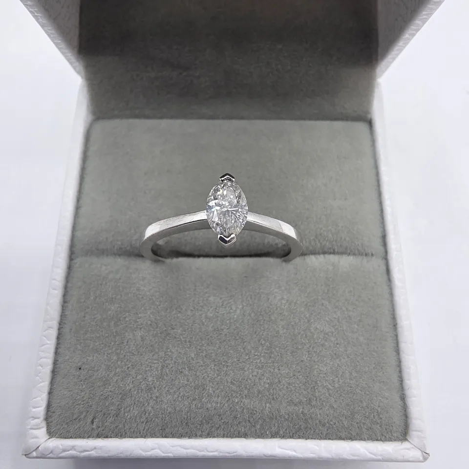 18CT WHITE GOLD SOLITAIRE RING SET WITH A MARQUISE CUT NATURAL DIAMOND