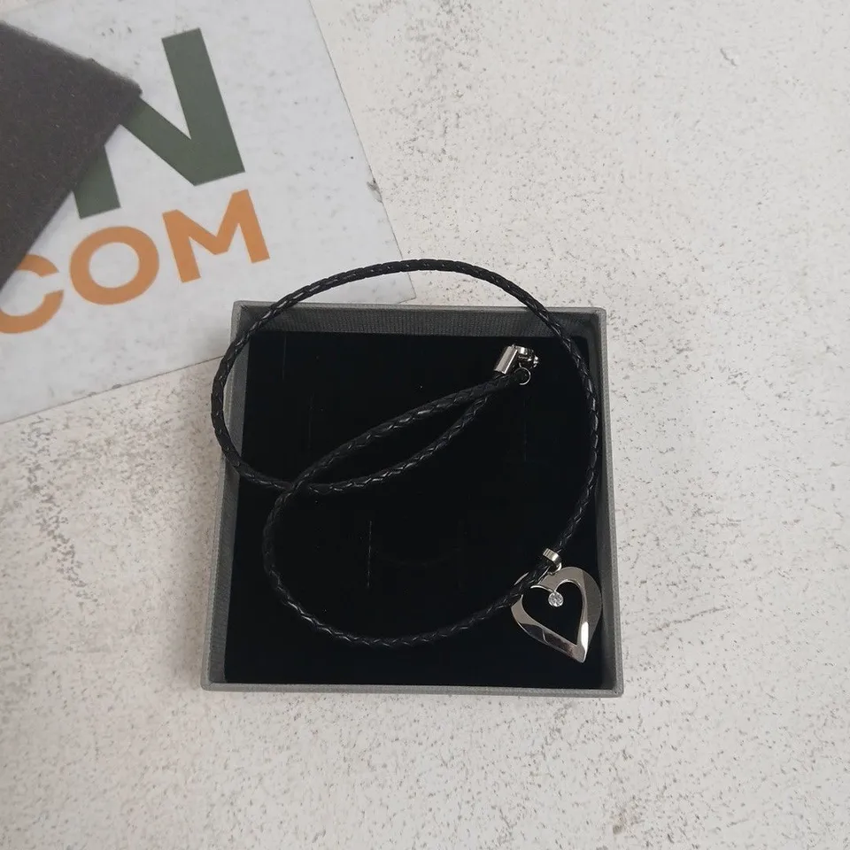 FIRETTI HEART CHARM BRACELET ON BLACK BRAIDED CORD – BOXED