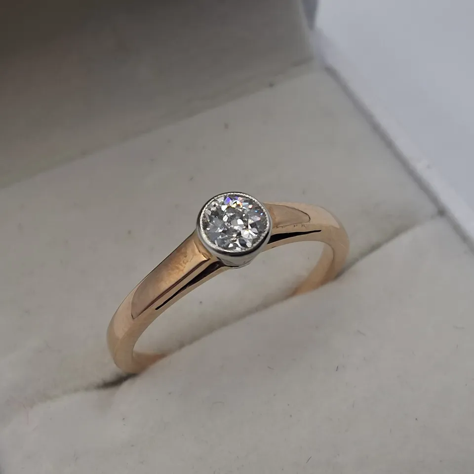 SOLITARE RING SET WITH NATURAL RUB OVER DIAMOND
