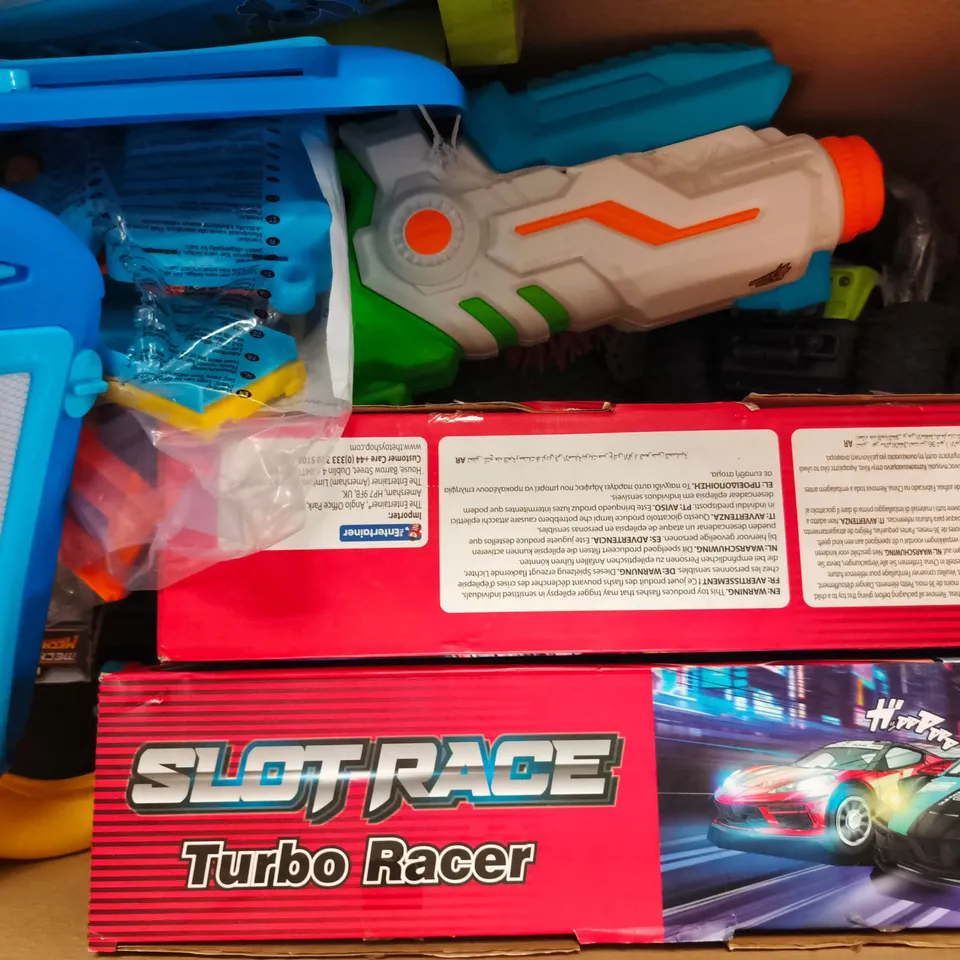 APPROXIMATELY 6 ASSORTED TOYS & GAMES PRODUCTS TO INCLUDE SCIENCE SLOT RACE TURBO RACER, STITCH WRITING BOARD, RC MONSTER TRUCK, ETC - COLLECTION ONLY