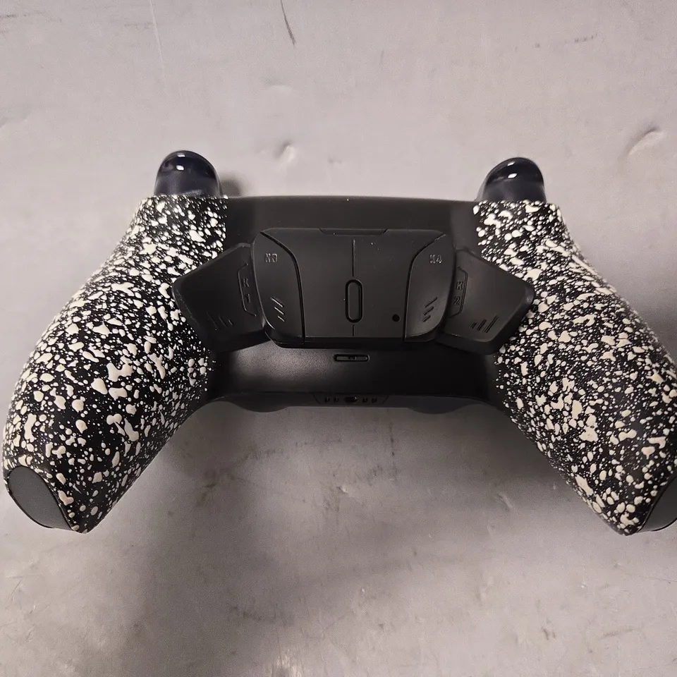 PLAYSTATION 5 GAMING CONTROLLER IN BLACK & WHITE 