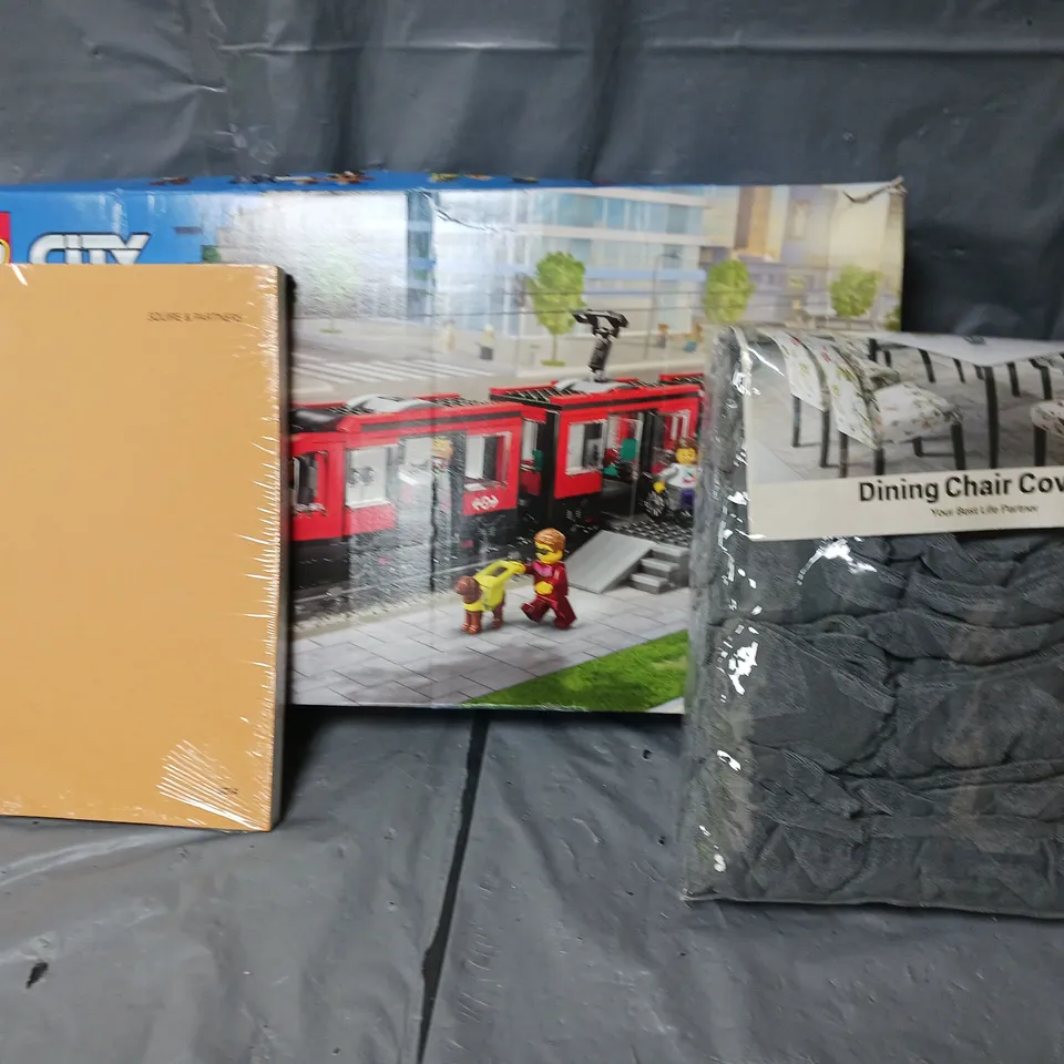 APPROXIMATELY 10 ASSORTED ITEMS TO INCLUDE NOTEBOOK, LEGO CITY SET, DINING CHAIR COVERS, ETC