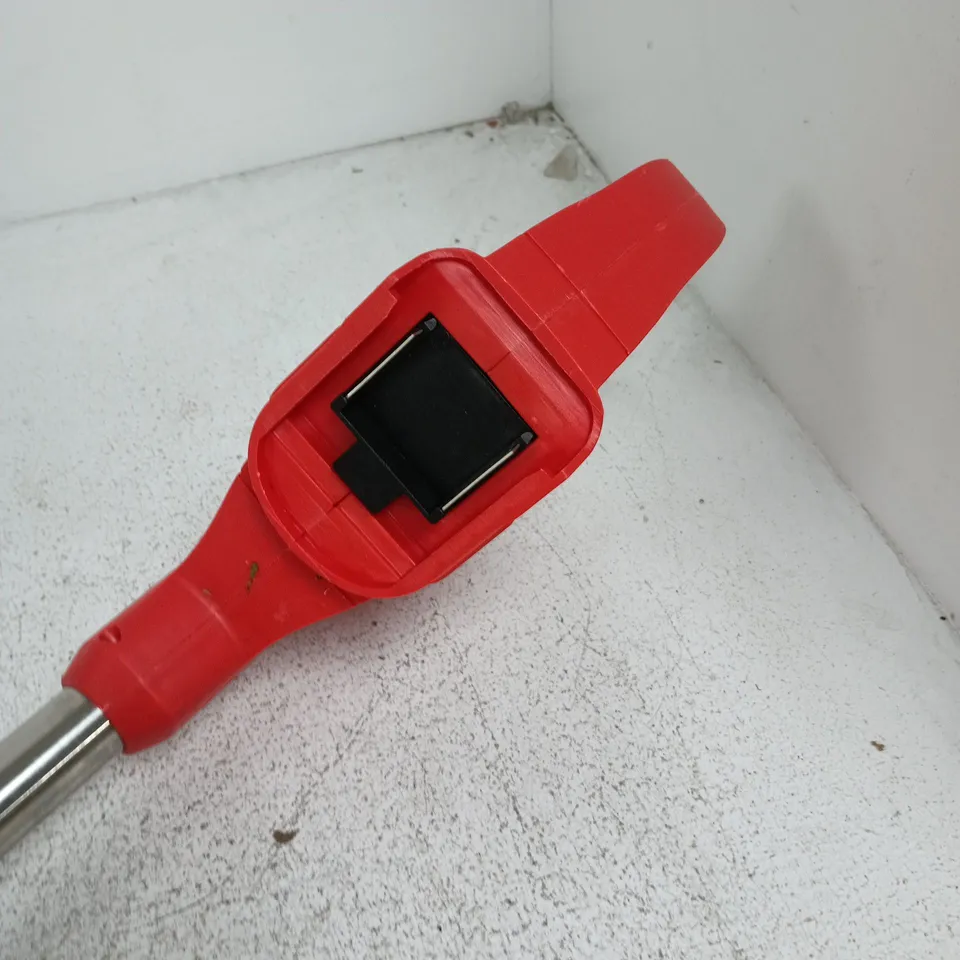 Red garden edger/brush cutter with dual-blade head