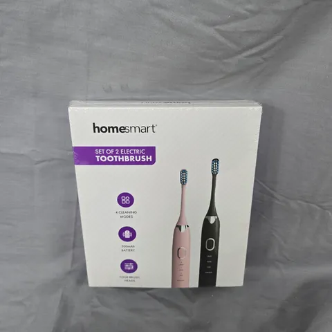 BOXED AND SEALED HOMESMART ELECTRIC TOOTHBRUSH SET OF 2 (PINK & BLACK)