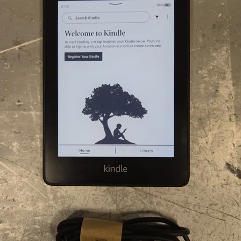 AMAZON KINDLE PAPERWEIGHT E-READER