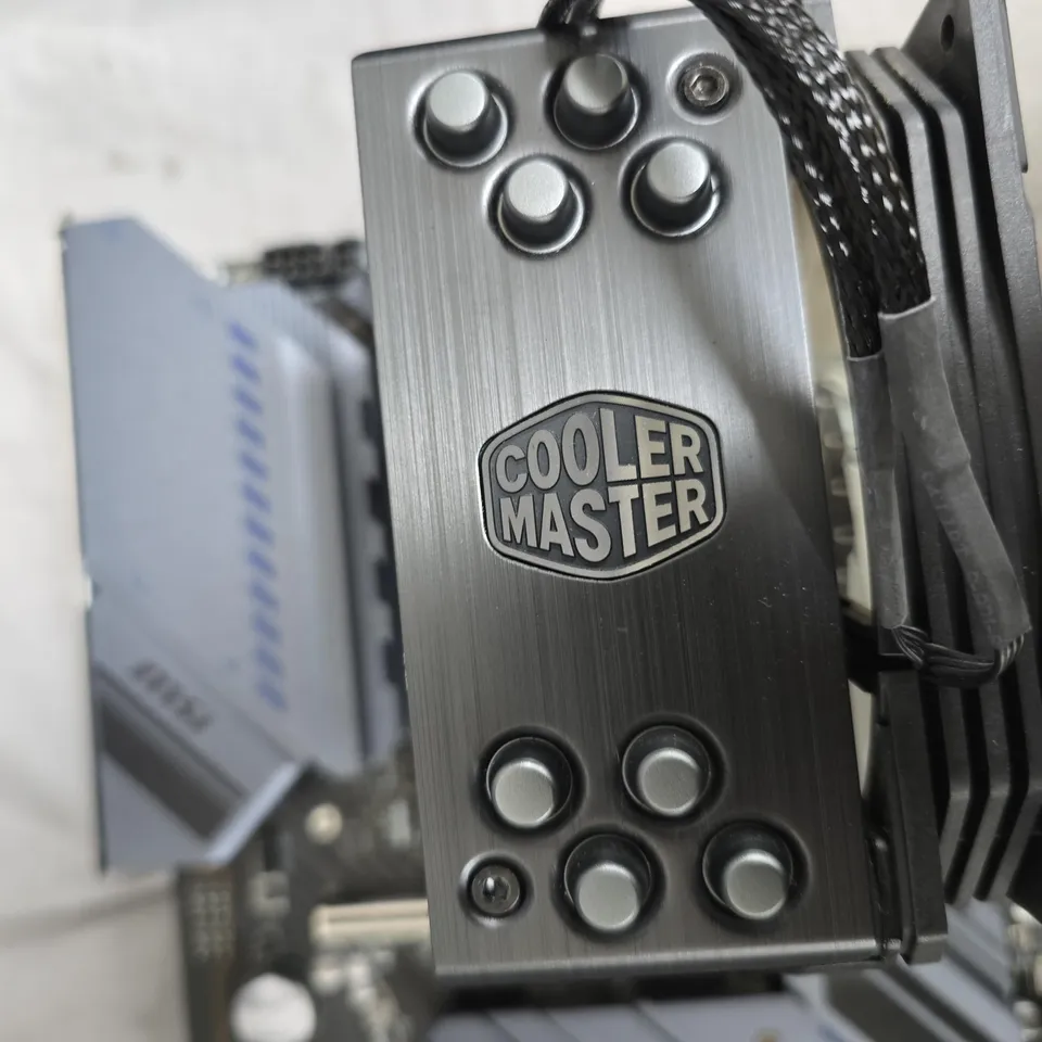 MSI TORPEDO MOTHERBOARD WITH COOLER MASTER CPU COOLER, RAM INSTALLED