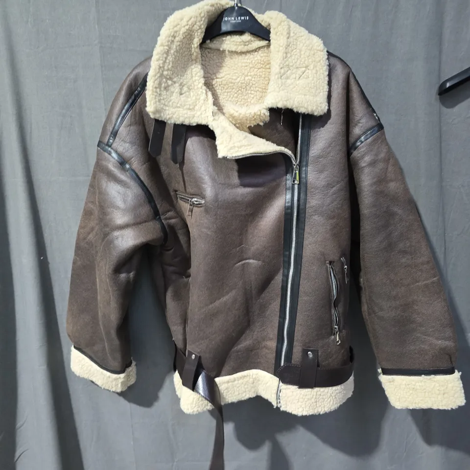 BOX OF APPROXIMATELY 25 CLOTHING ITEMS INCLUDING:BLACK AND BLUE STAR JUMPER, BROWN AND CREAM FUR COAT AND WHITE PUFFER