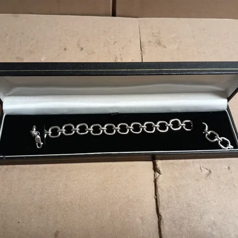 SILVER-TONE BRACELET WITH LARGE CIRCULAR LINKS IN PRESENTATION BOX