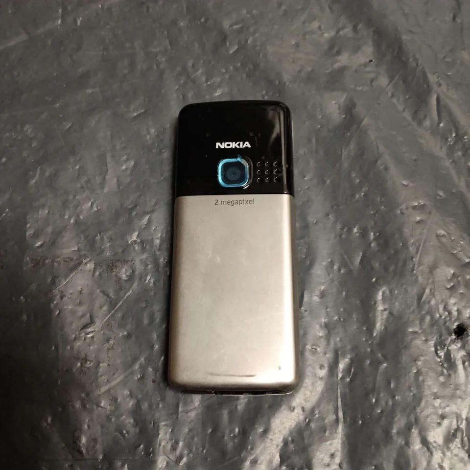 NOKIA CANDYBAR MOBILE PHONE – 2 MP CAMERA 
