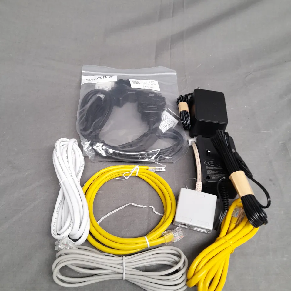 BOX OF ASSORTED CABLES AND WIRES