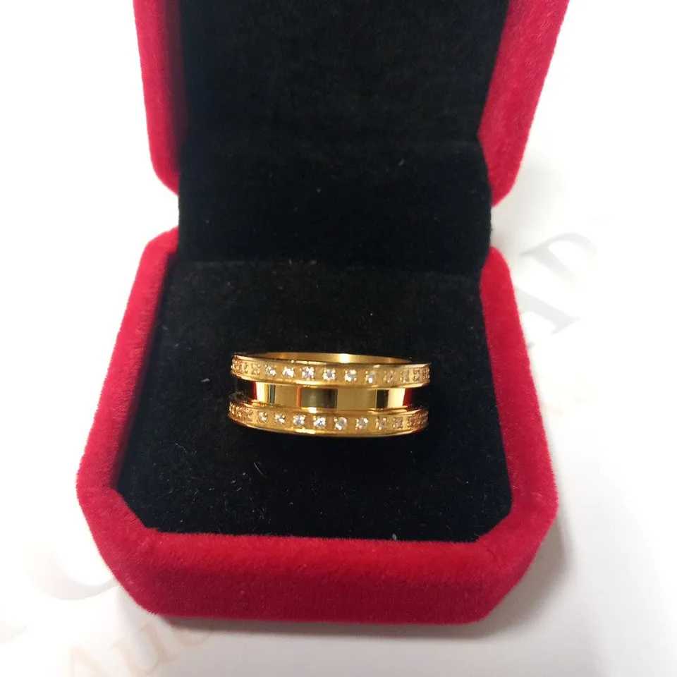 BERING GOLD PLATED STONE SET OUTER RING SIZE 8