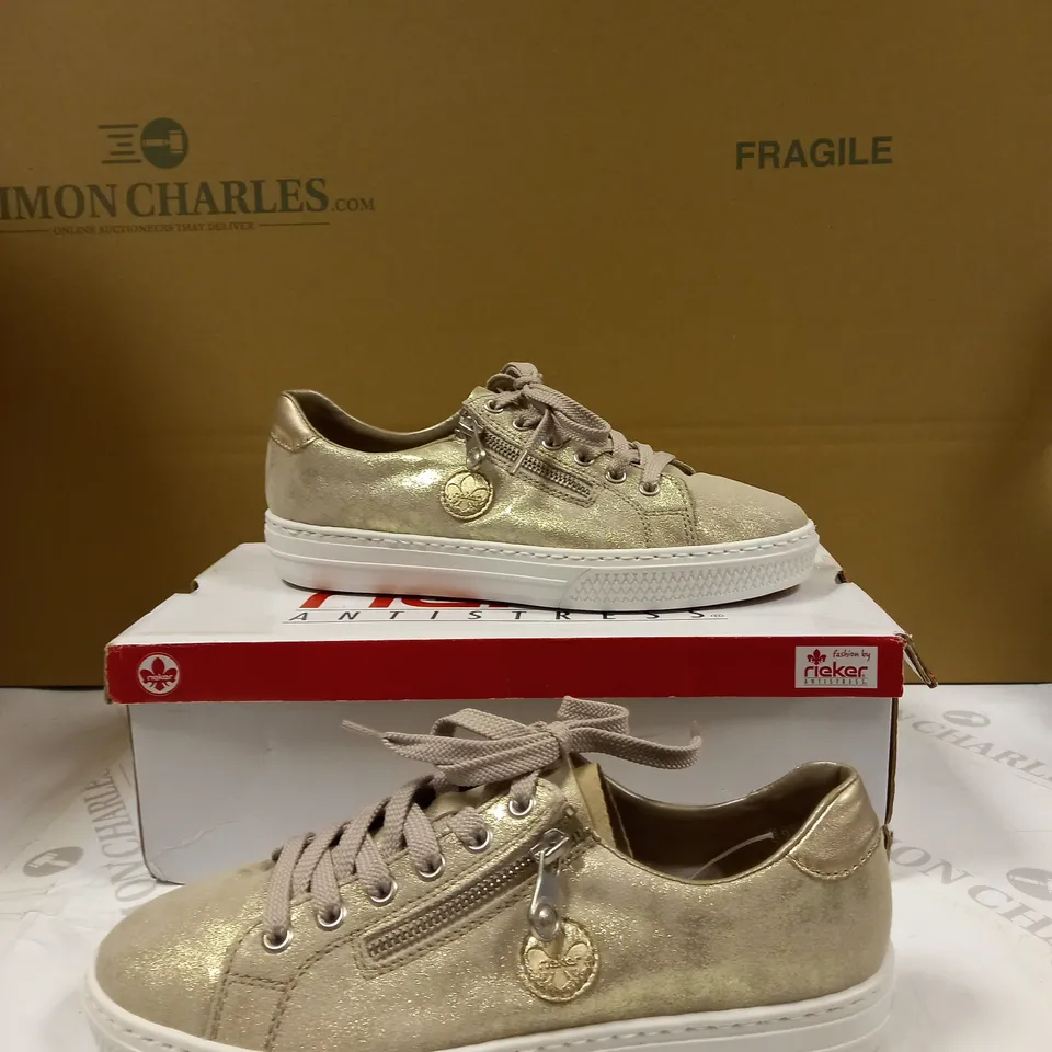 BOXED PAIR OF RIEKER GOLD METALLIC TRAINERS - SIZE 6