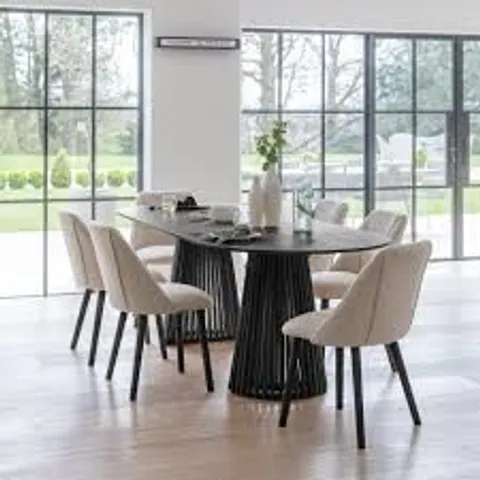 BOXED LAURA JAMES WILLOW STAINED BLACK OVAL DINING TABLE (1 BOX)