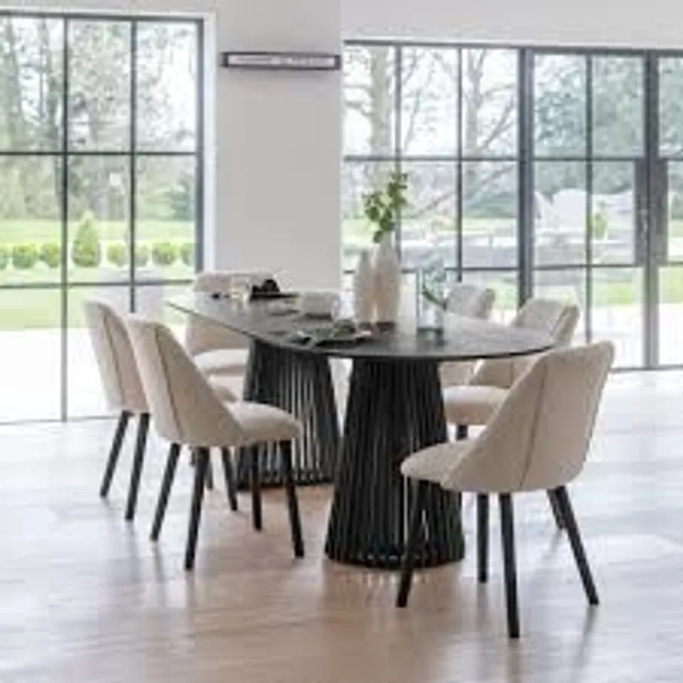 BOXED LAURA JAMES WILLOW STAINED BLACK OVAL DINING TABLE (1 BOX)